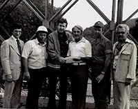 John Murtha  and others at the Bailey Bridge in New Florence, PA after the Johnstown Flood. 1977.