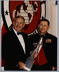 	John Murtha receiving the USMC Iron Mike Award, 1998.