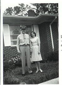 John and Joyce Murtha outside of their home, 1960s.